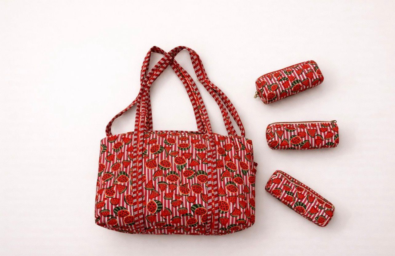 Conjunto bolso y estuches a juego