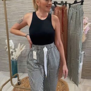 Pantalón de pernera ancha con estampado de pata de gallo